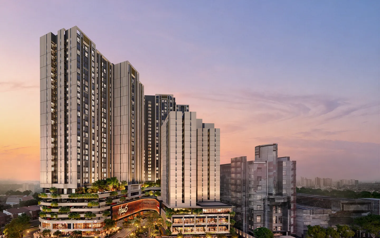 Haus On 15 at dusk: two towers of homes above a terraced, planted podium, with Block C to the right.