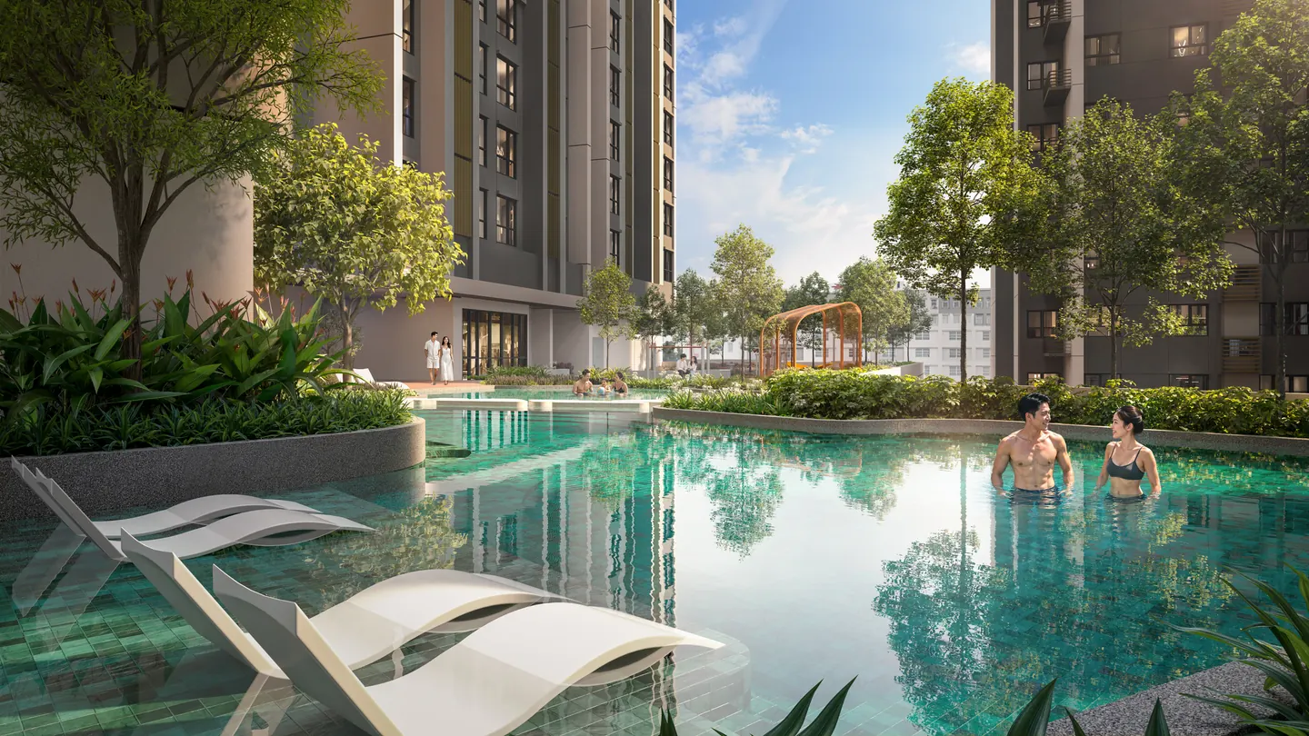 The pools on Level 7 in daylight, with loungers in the shallows and trees between the towers.